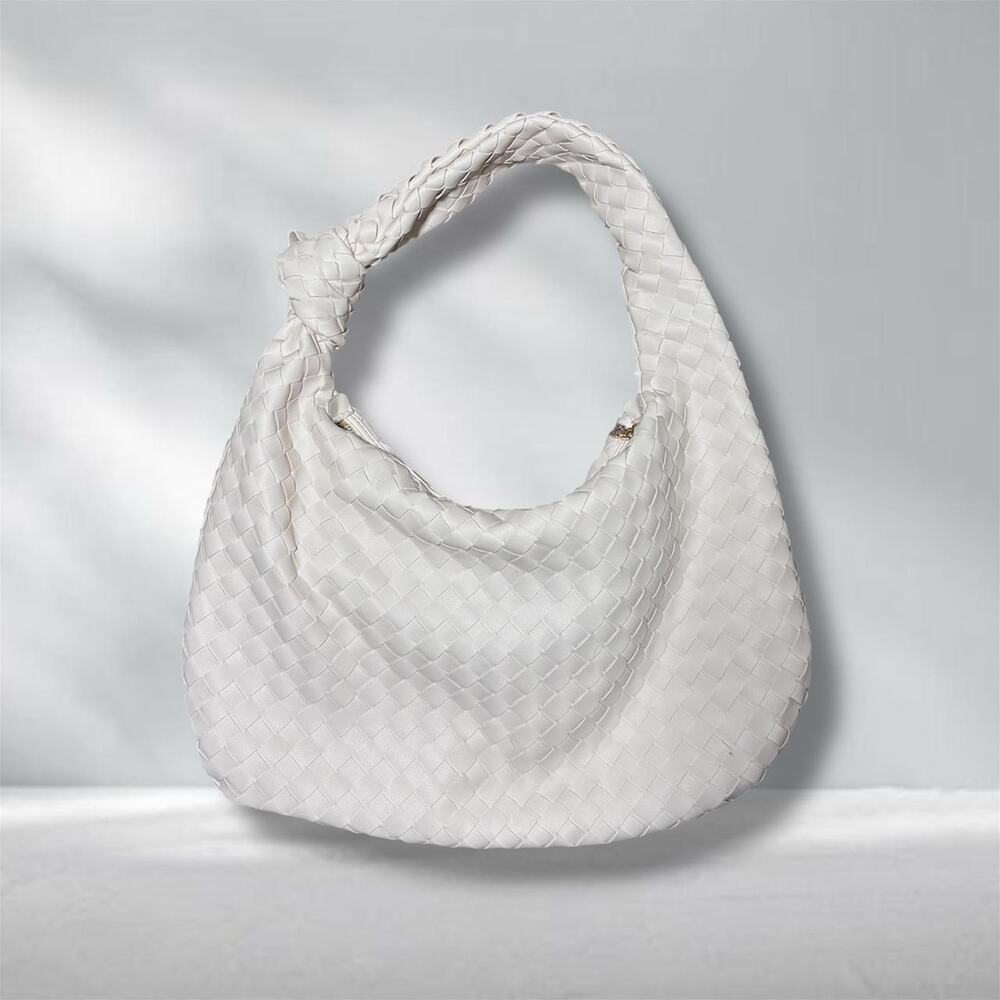 Oversized white woven knot bag